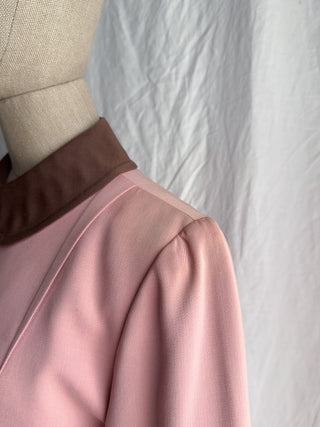 Close-up of a the left shoulder on a 1940s wool gabardine jacket 
