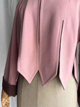 A close-up view o the unique point hem on a custom 1940s George's of Hollywood jacket.