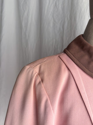 Close-up of a the right shoulder on a 1940s wool gabardine jacket 