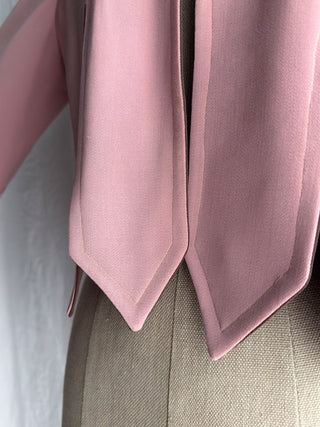 Macro shot of the fabric texture and stitching on a custom 1940s George's of Hollywood jacket.