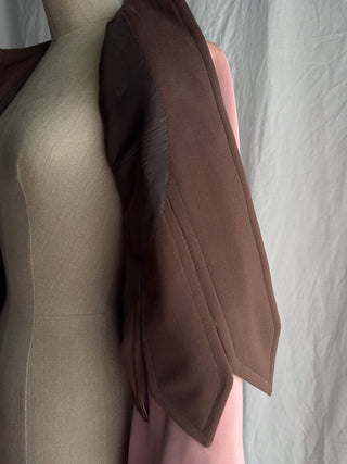 Interior lining and hand stitching on a vintage 1940s George's of Hollywood tailored jacket.