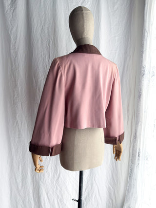 Back view of a 1940s George's of Hollywood custom tailoring jacket showing the silhouette and seam details.